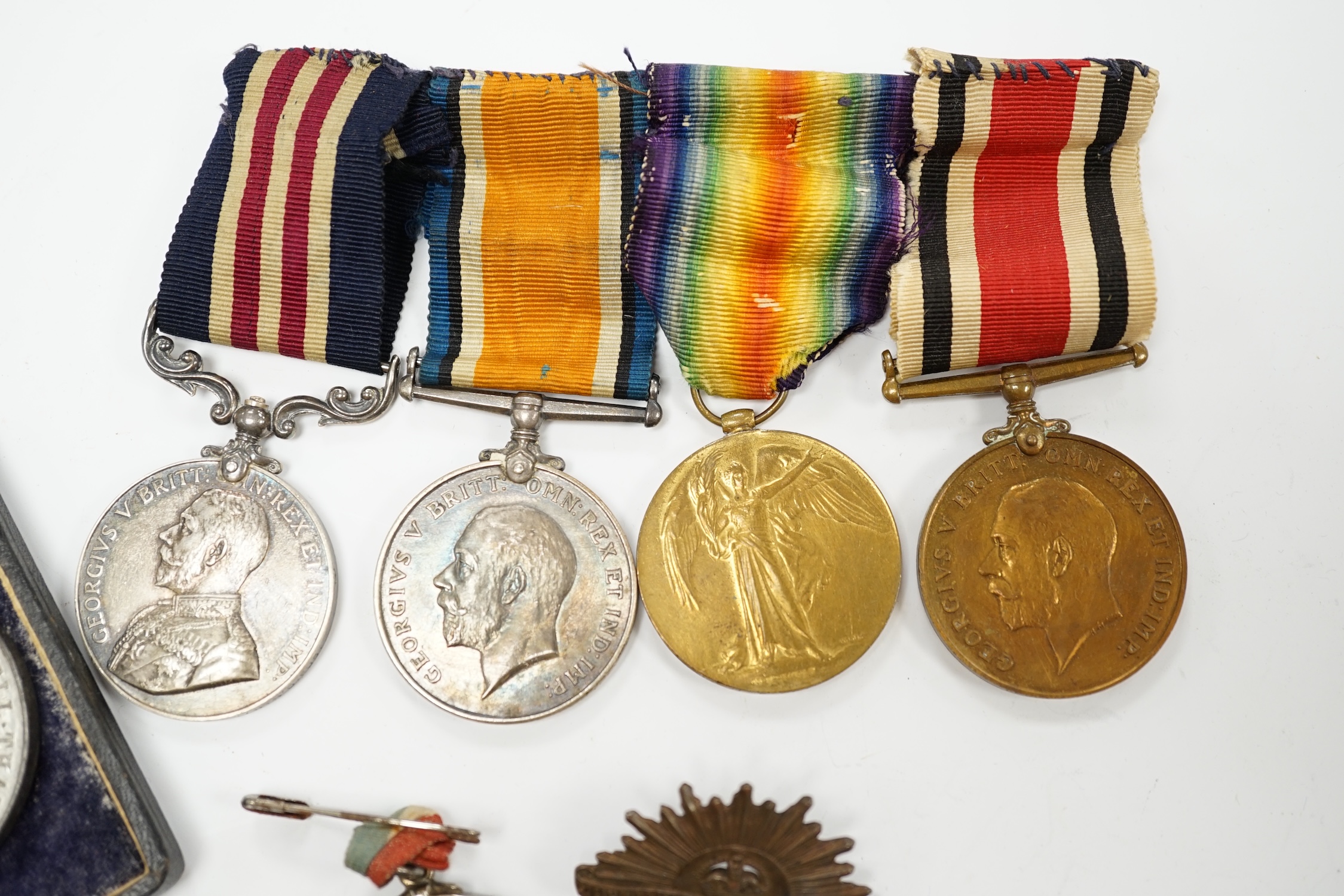 Two First World War medal groups; a military medal group awarded to Pte. H.S. Cribb, 23rd Northumberland Fusiliers, comprising; the Military Medal for Bravery in the Field, the Special Constabulary Medal, the War Medal a